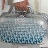 Dior và Rimowa hợp tác cho ra bộ sưu tập phụ kiện du lịch sành điệu