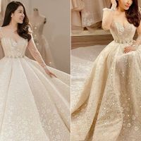 Váy cưới siết eo mang hơi thở mùa xuân được thiết kế dành riêng cho cô dâu Duyên Hà (Quảng Trị). Họa tiết hoa cỏ và những dải dây leo mềm mại giữ vai trò chủ đạo trên thân váy. Phần tà váy xếp nếp tạo dáng như một bông hoa nhiều cánh. Khi cô dâu ngồi xuống, những cánh hoa ấy xòe rộng sang hai bên tạo dáng như một bông hoa ở thời điểm nở rộ nhất, đẹp đẽ nhất. Một điểm đặc biệt khác được NTK tiết lộ chính là những bông hoa nhũ trắng được dập nổi trên trên váy, tạo sự tương phản độc đáo giữa sắc trắng của hoa và lớp vải tuyn màu nude.