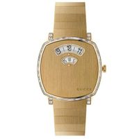 gucci grip in 18k gold with baguette diamonds