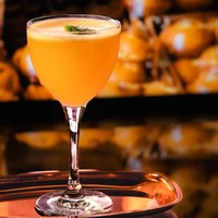Opaque cocktail in warm light.  