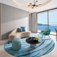 Phòng khách tích hợp trong căn suite 1 phòng ngủ hướng biển của voco Ma Belle Danang 