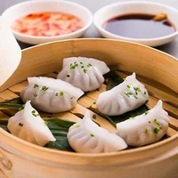 Những món ăn cầu may nhất định phải có  trên mâm cỗ Tết của các nước