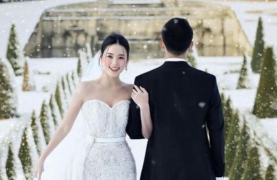 Midu mặc váy cưới giá gần 130 triệu đồng, chụp hình dưới tuyết tại lâu đài cổ ở Pháp