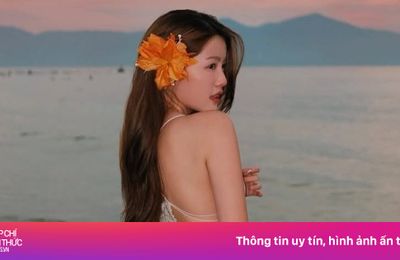 Tăng Mỹ Hàn khoe lưng trần quyến rũ bên bãi biển