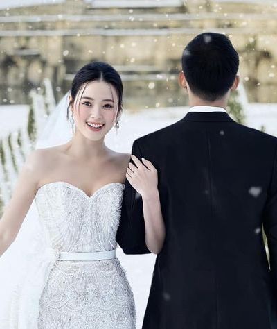 Midu mặc váy cưới giá gần 130 triệu đồng, chụp hình dưới tuyết tại lâu đài cổ ở Pháp