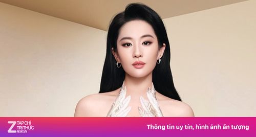 Lưu Diệc Phi mặc váy gợi cảm của NTK Việt