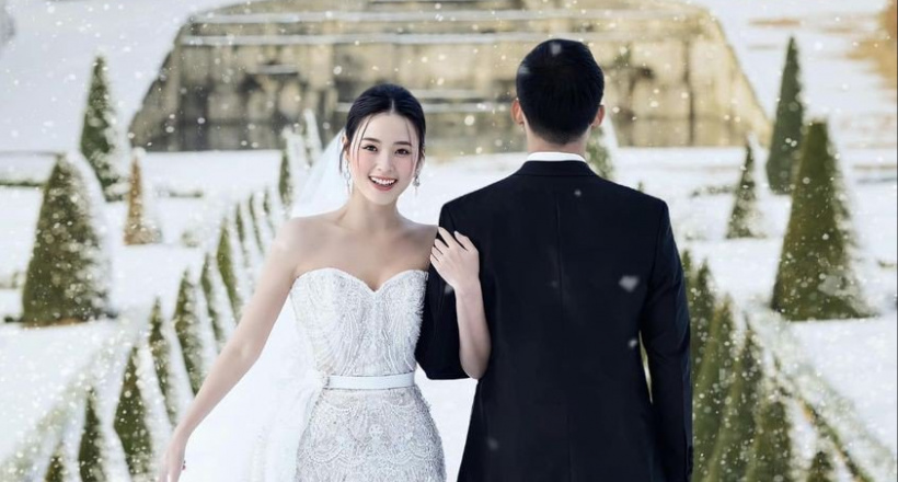 Midu mặc váy cưới giá gần 130 triệu đồng, chụp hình dưới tuyết tại lâu đài cổ ở Pháp