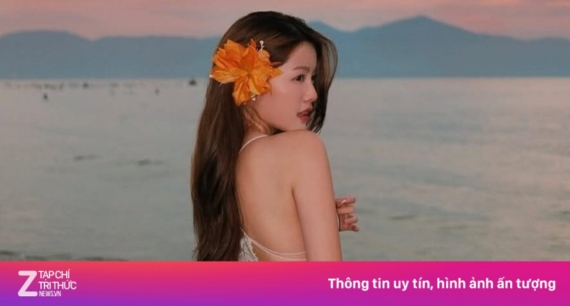 Tăng Mỹ Hàn khoe lưng trần quyến rũ bên bãi biển