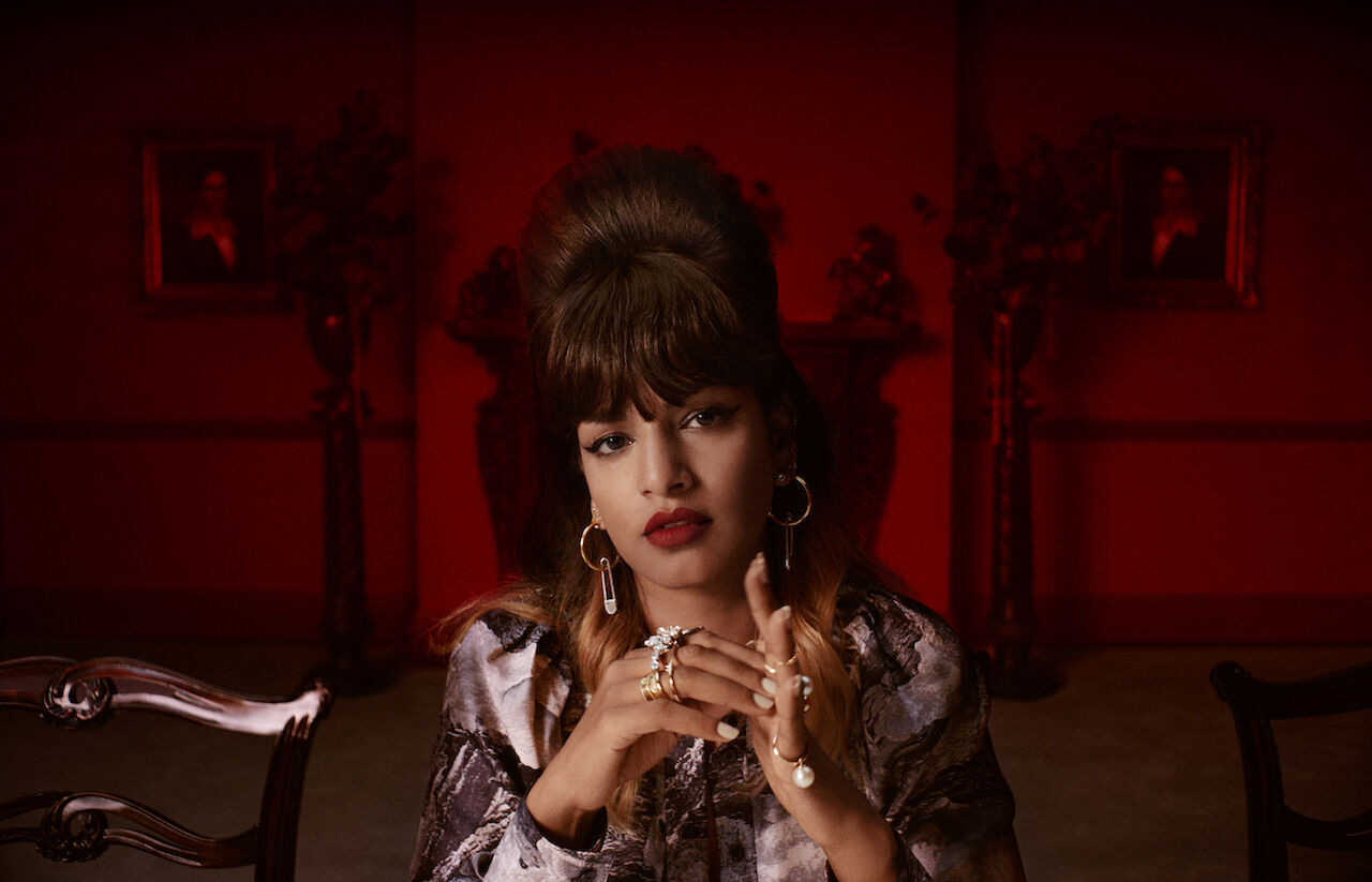 M.I.A-wears-archive-print-scarves-and-hoop-earrings-with-kilt-pins-c-Courtesy-of-Burberry.jpg