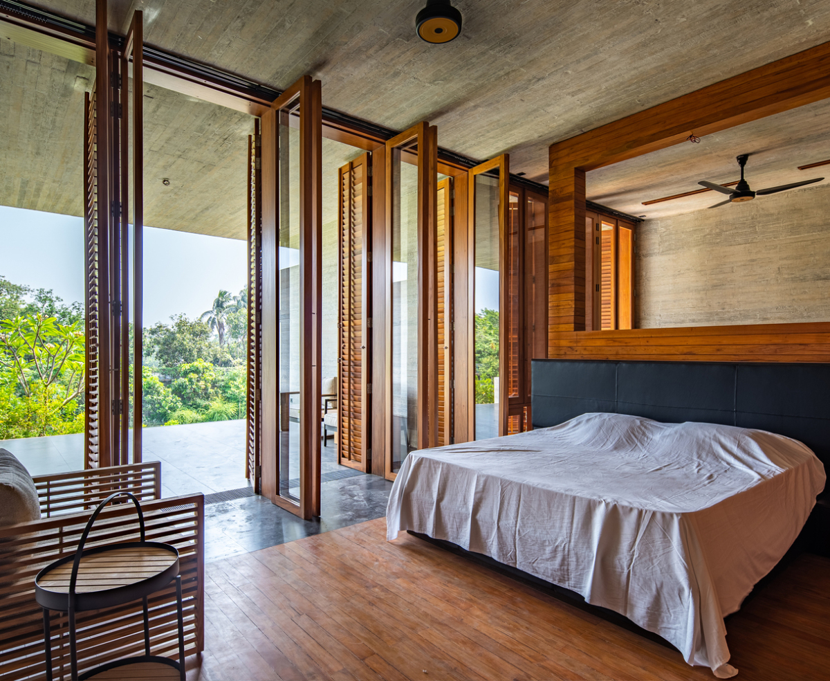 Biệt thự như khối hộp rỗng giữa đồi cây