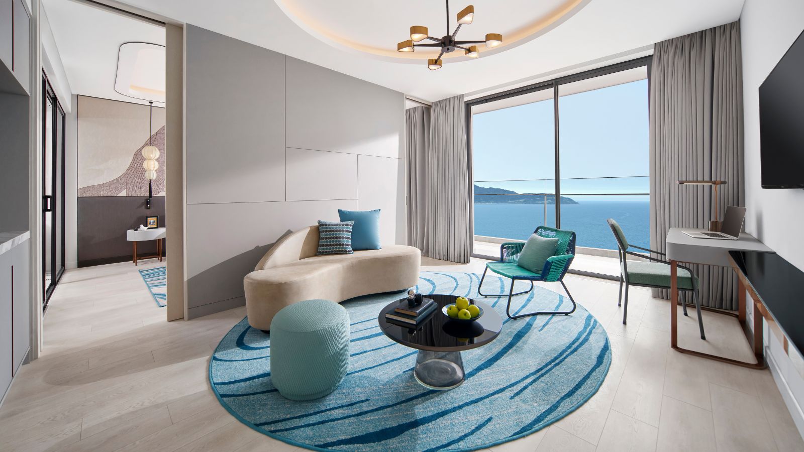 Phòng khách tích hợp trong căn suite 1 phòng ngủ hướng biển của voco Ma Belle Danang 