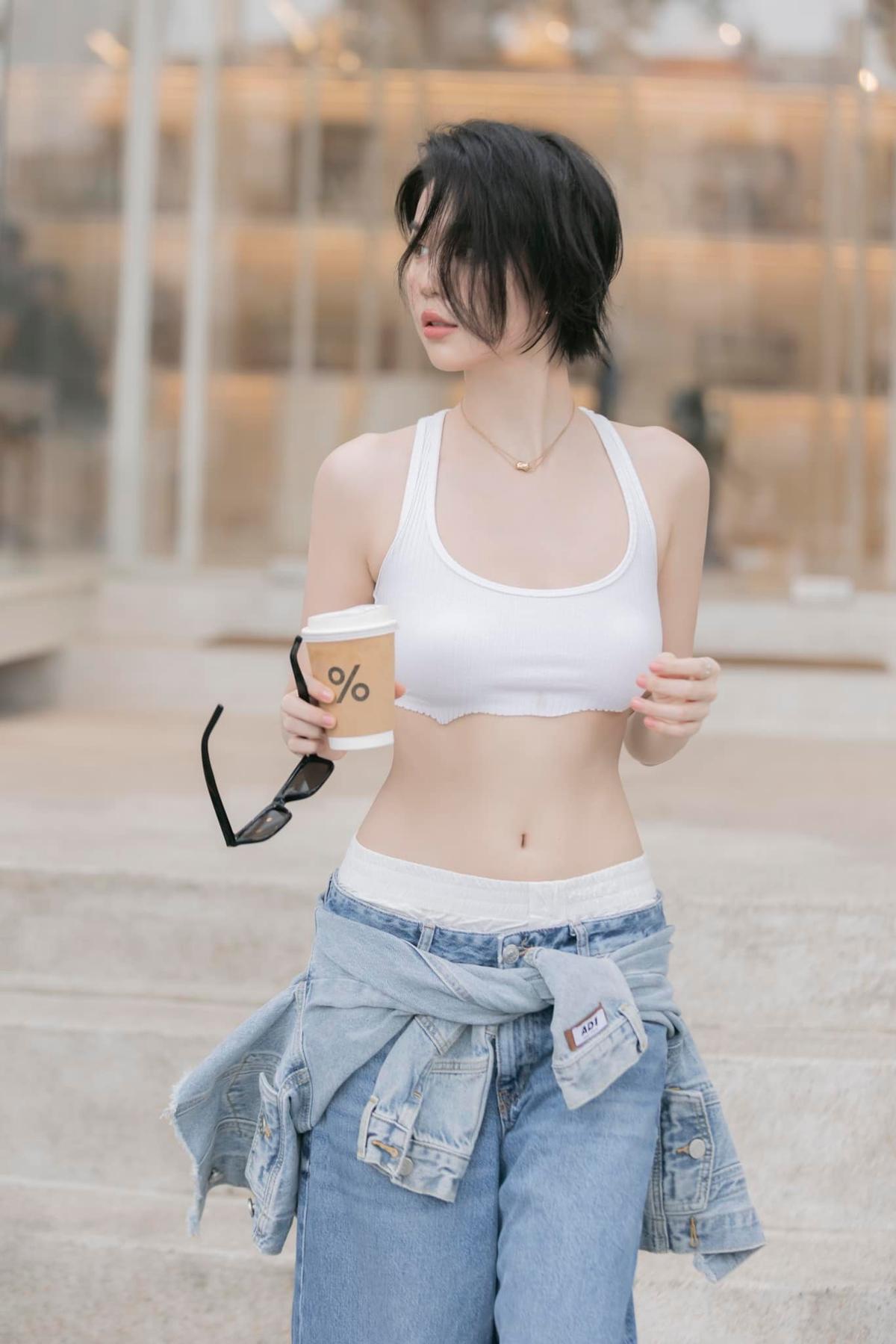 Ngọc Trinh cắt tóc tém
